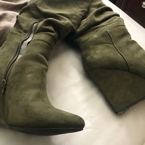 Tall army green heeled boots